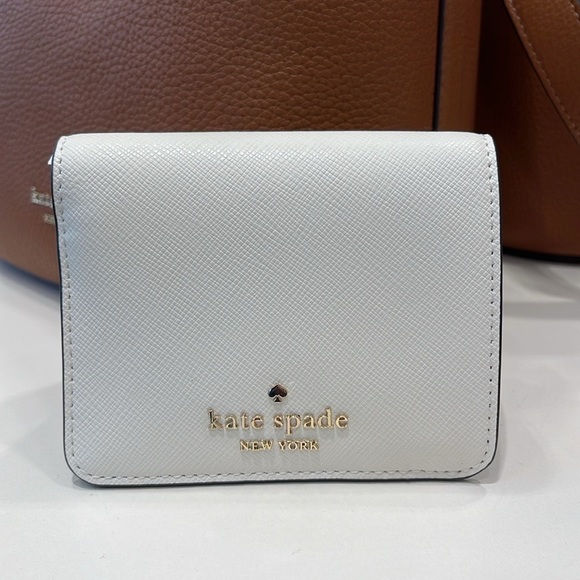 Kate Spade Madison Small Bifold Wallet
Meringue 
NWT - Picture 2 of 16